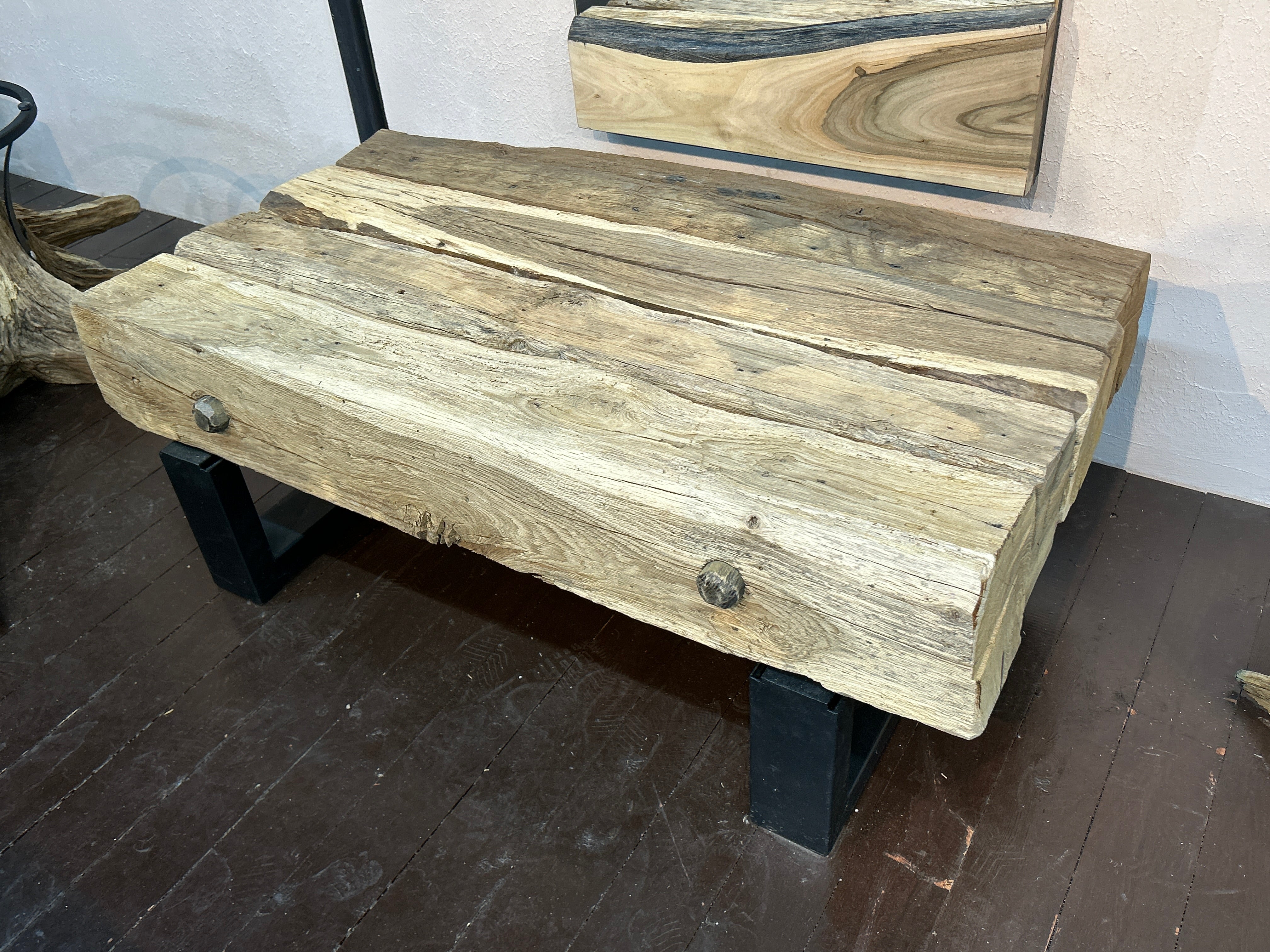 Rectangular rustic coffee table made from wooden beams