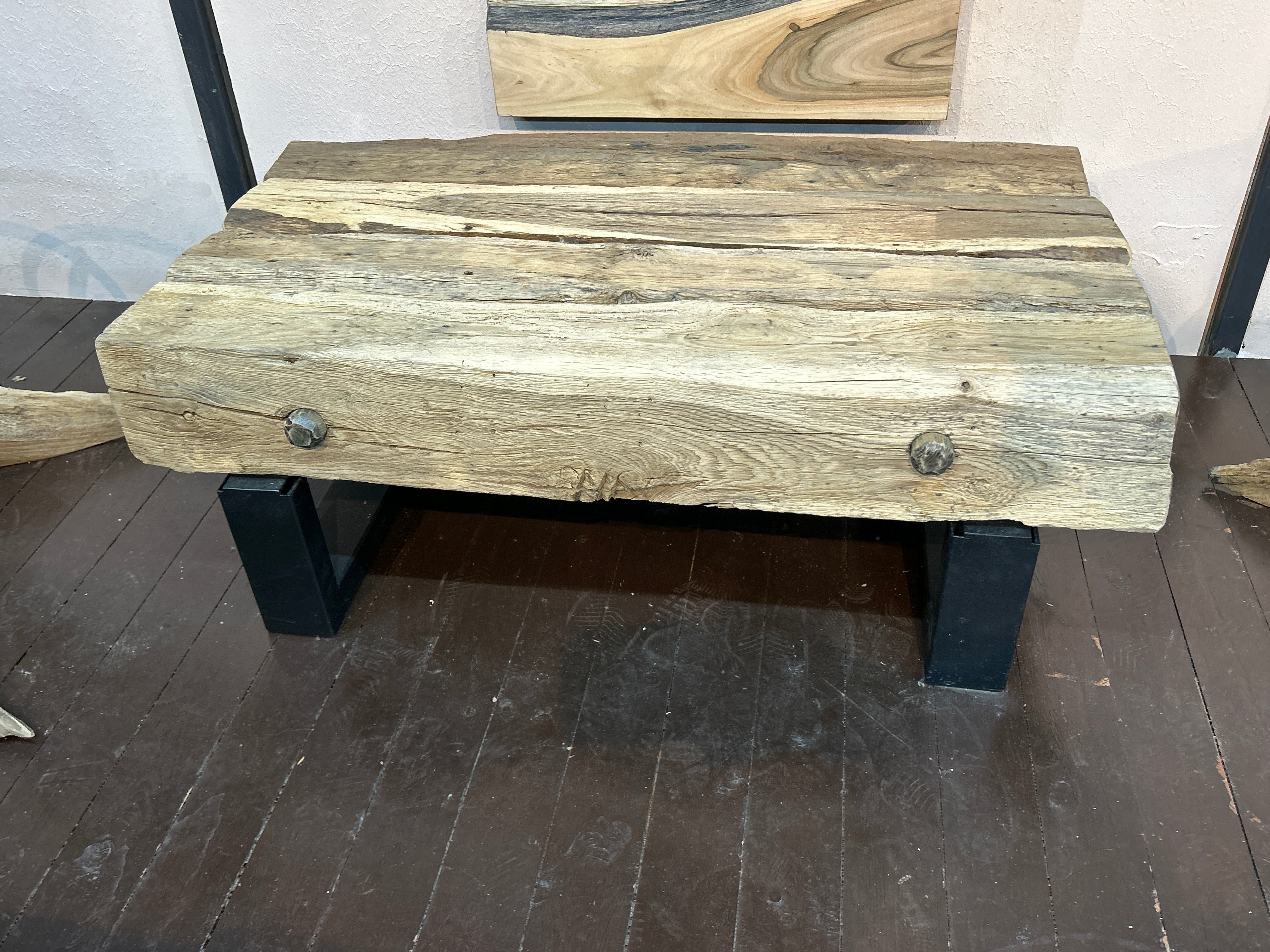 Rectangular rustic coffee table made from wooden beams