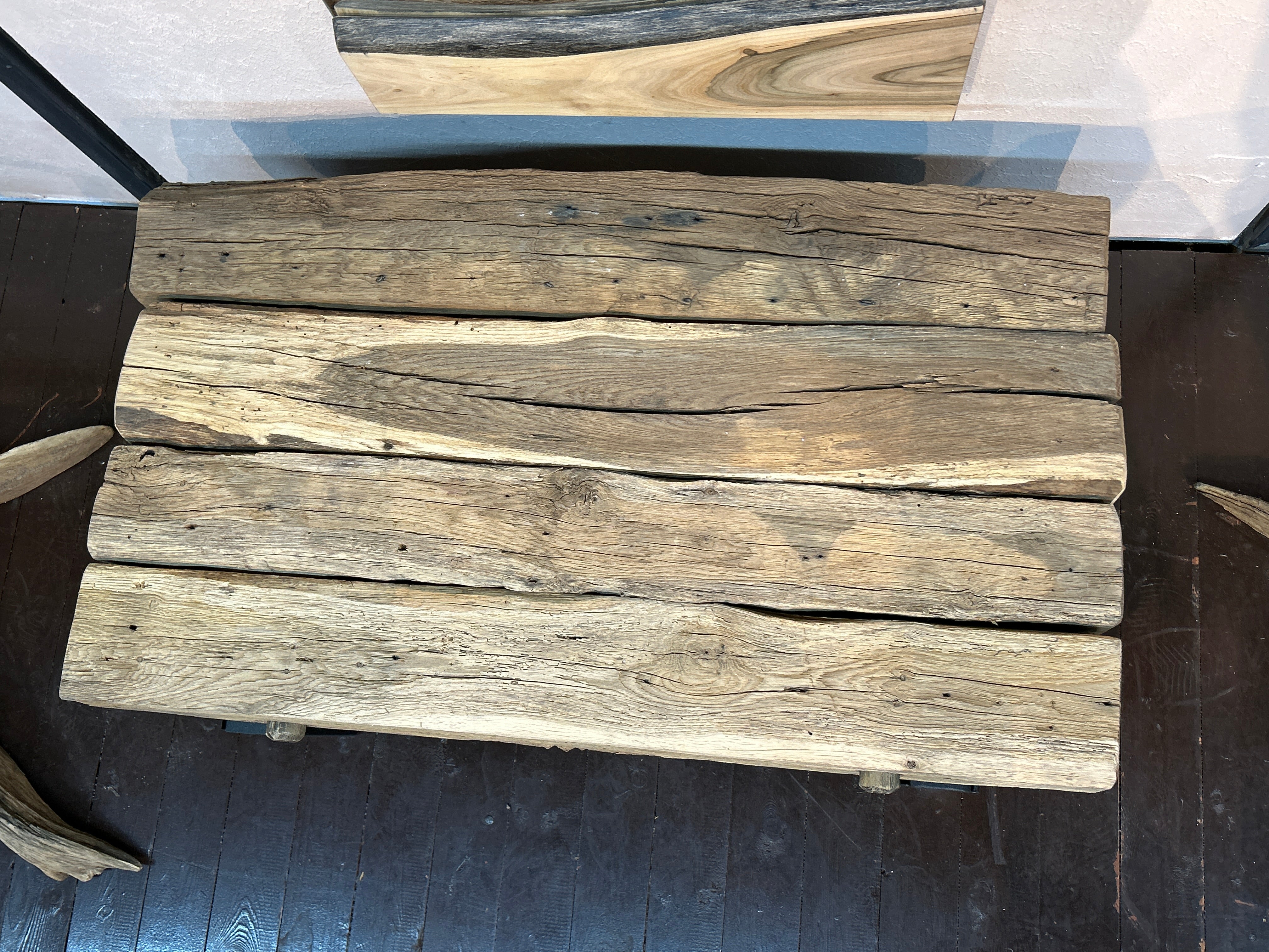 Rectangular rustic coffee table made from wooden beams