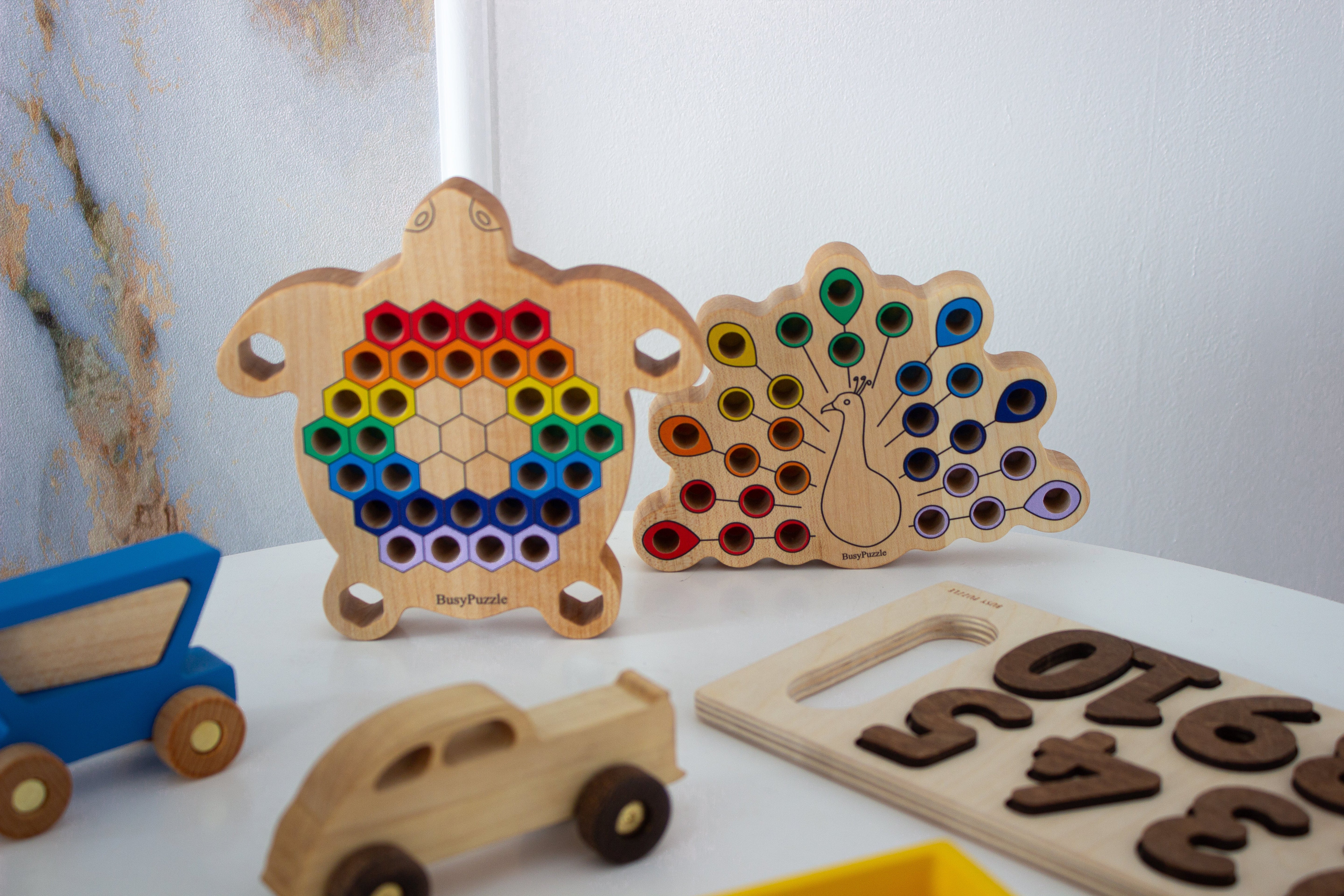 Montessori-Sensorikspielzeug Holzpfau- HolzRepublik