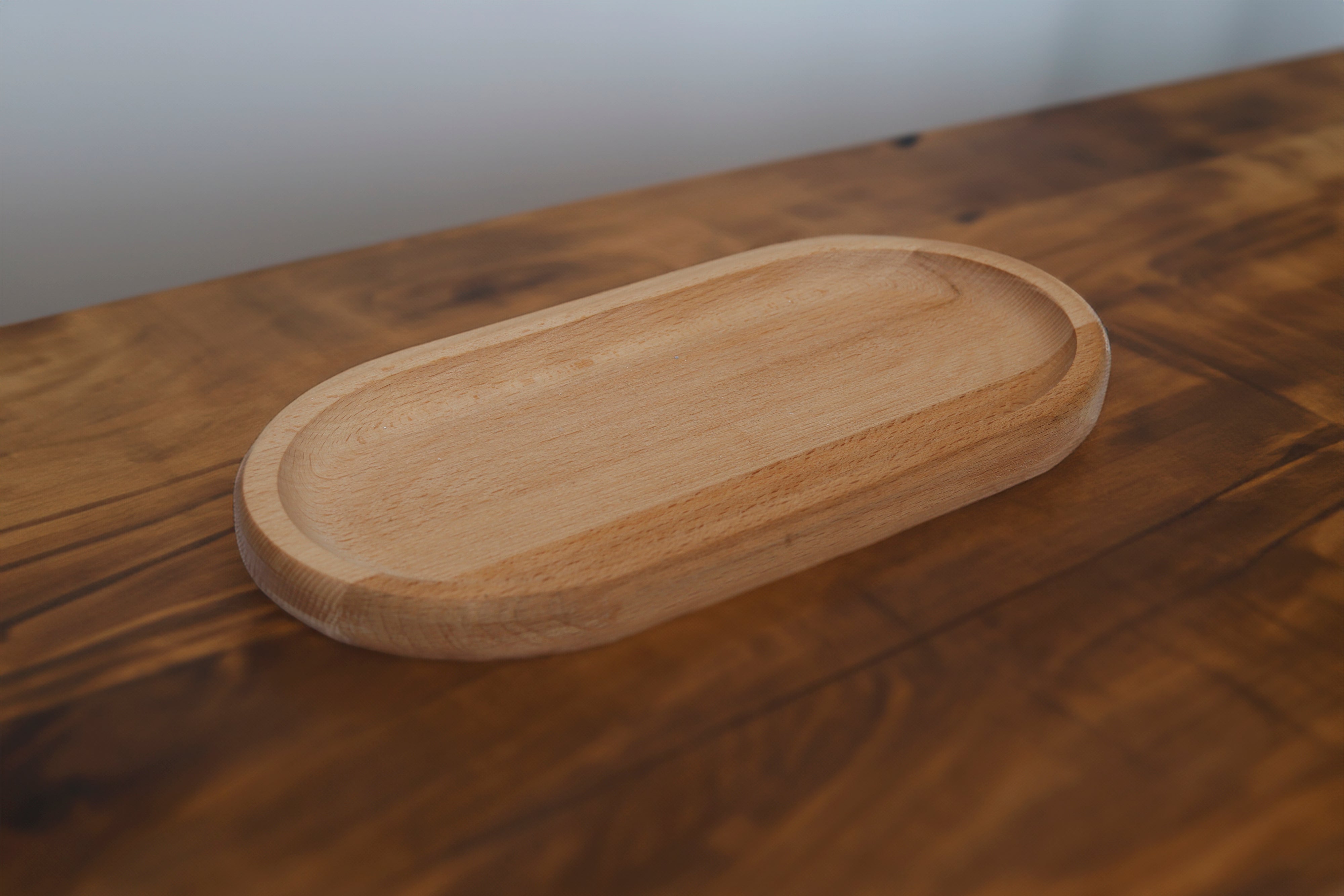 Holzkopfmassager "Molekül" & Elegante Eichen Tray